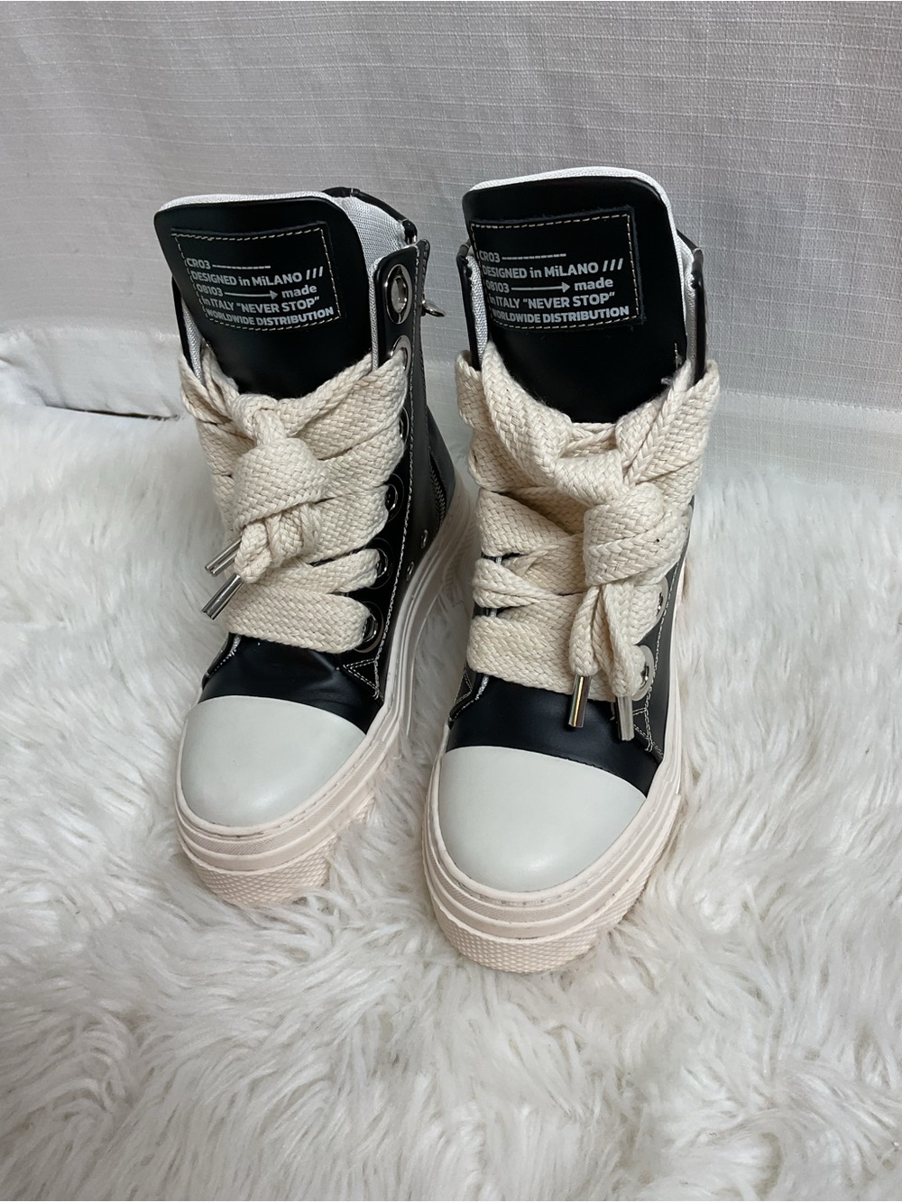 Chunky High-Top Sneakers in Black and Cream